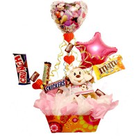 /album/fotogaleria%3a-dulces-d%c2%b4talles/arreglo-changuito-con-globos-y-chocolates-jpg1/